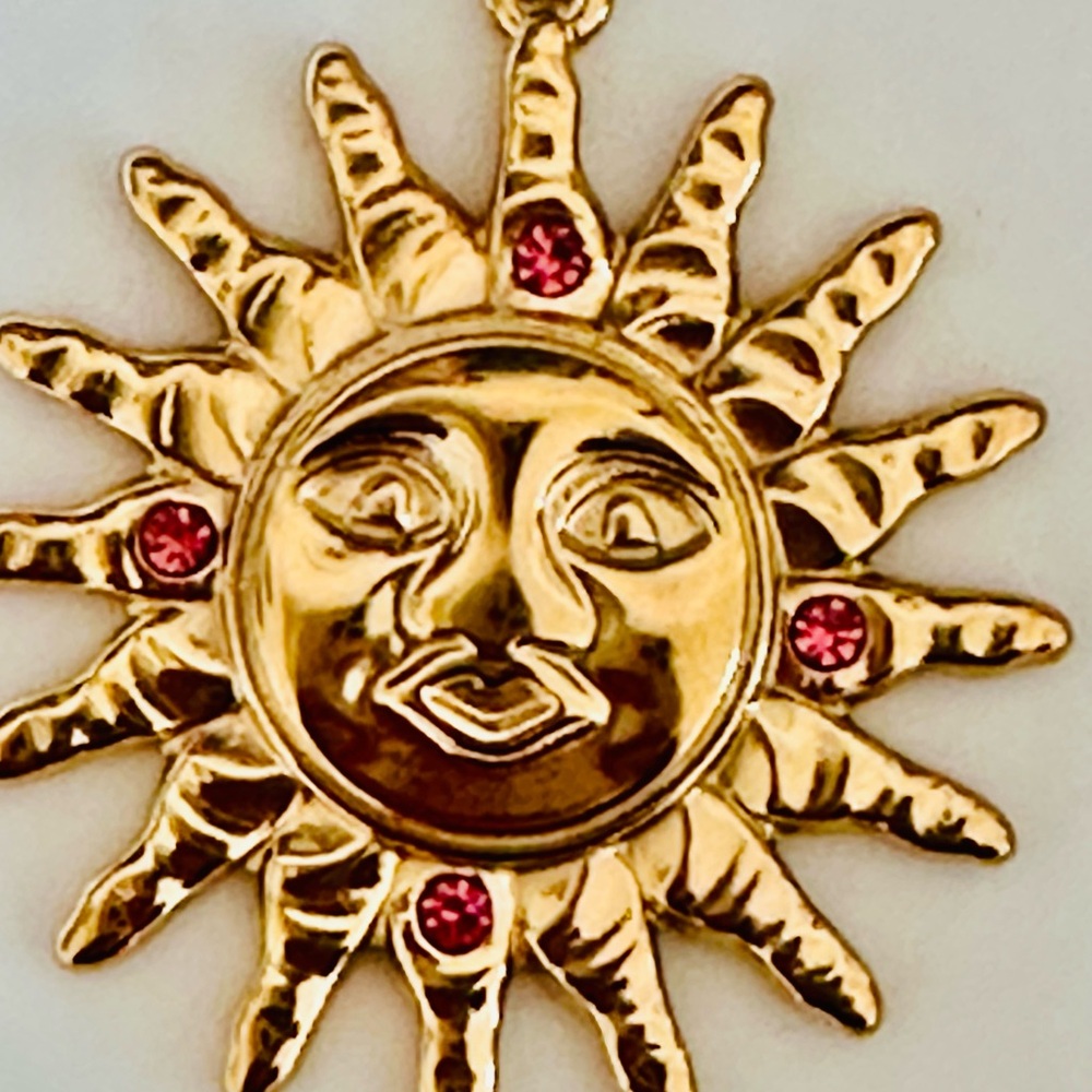 Gold Sunburst Pendant with Pink Crystal Accents